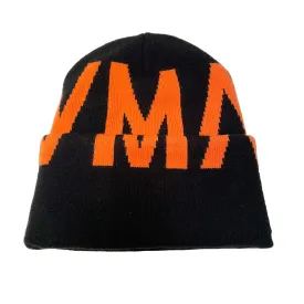 HVMAN KNIT CAP IN BLACK /W RED LOGO